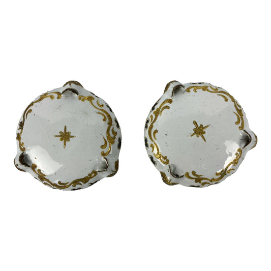 Battersea 18th century. Pair of table service pieces in white and gold enameled copper, condiments, salt pots