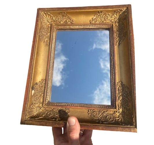 Miroir ancien en bois doré
