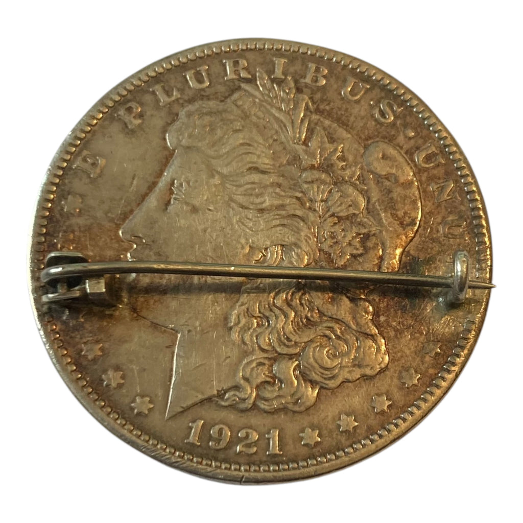 Broche avec pièce de 1$