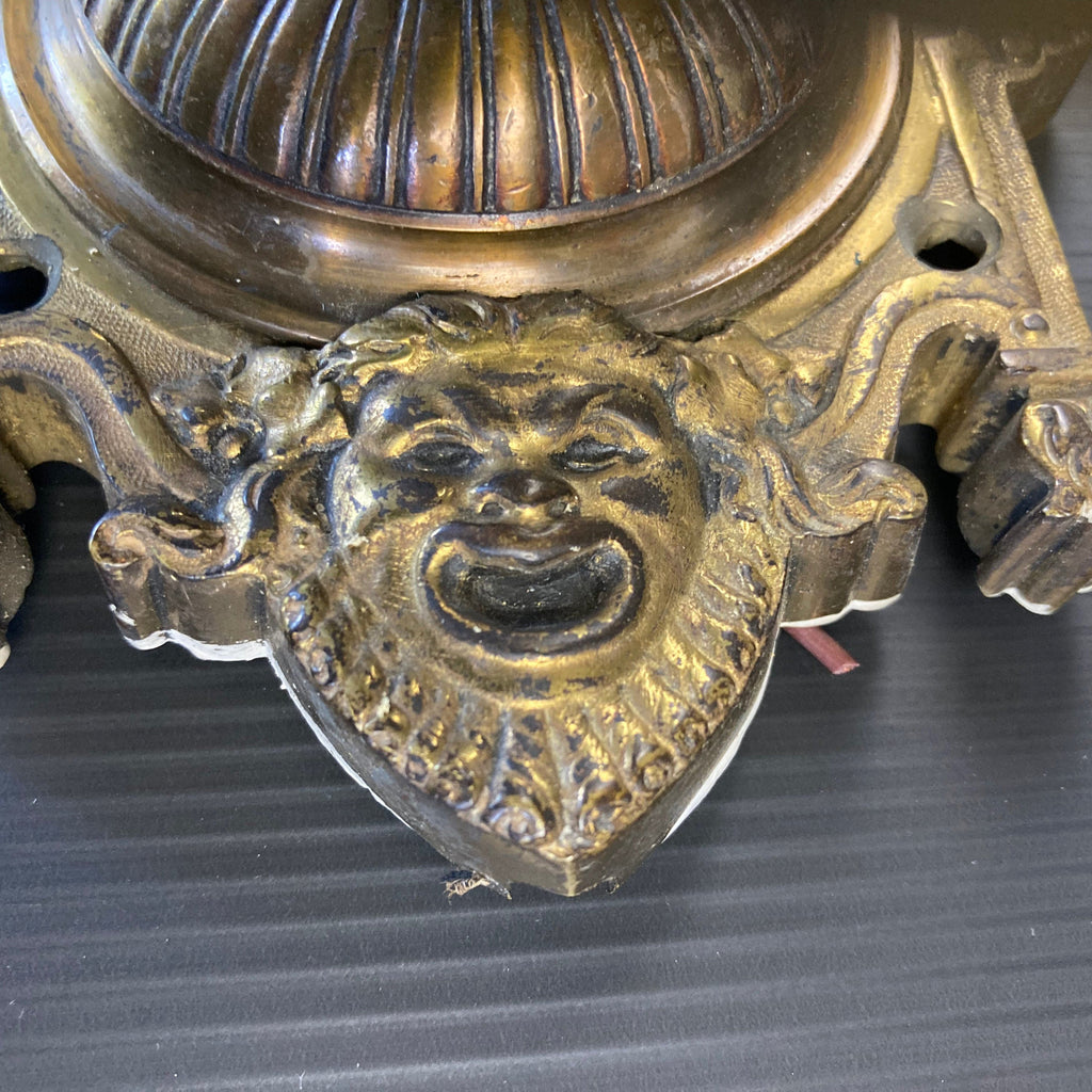 Ancienne applique murale en bronze forme de  lampe à huile antique