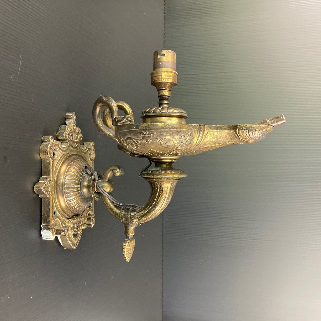 applique murale en bronze forme antique