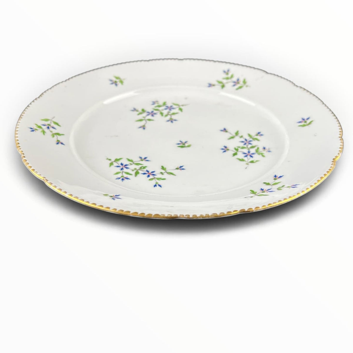 Assiette en porcelaine de Bordeaux XVIIIe siècle. Décor aux barbeaux.