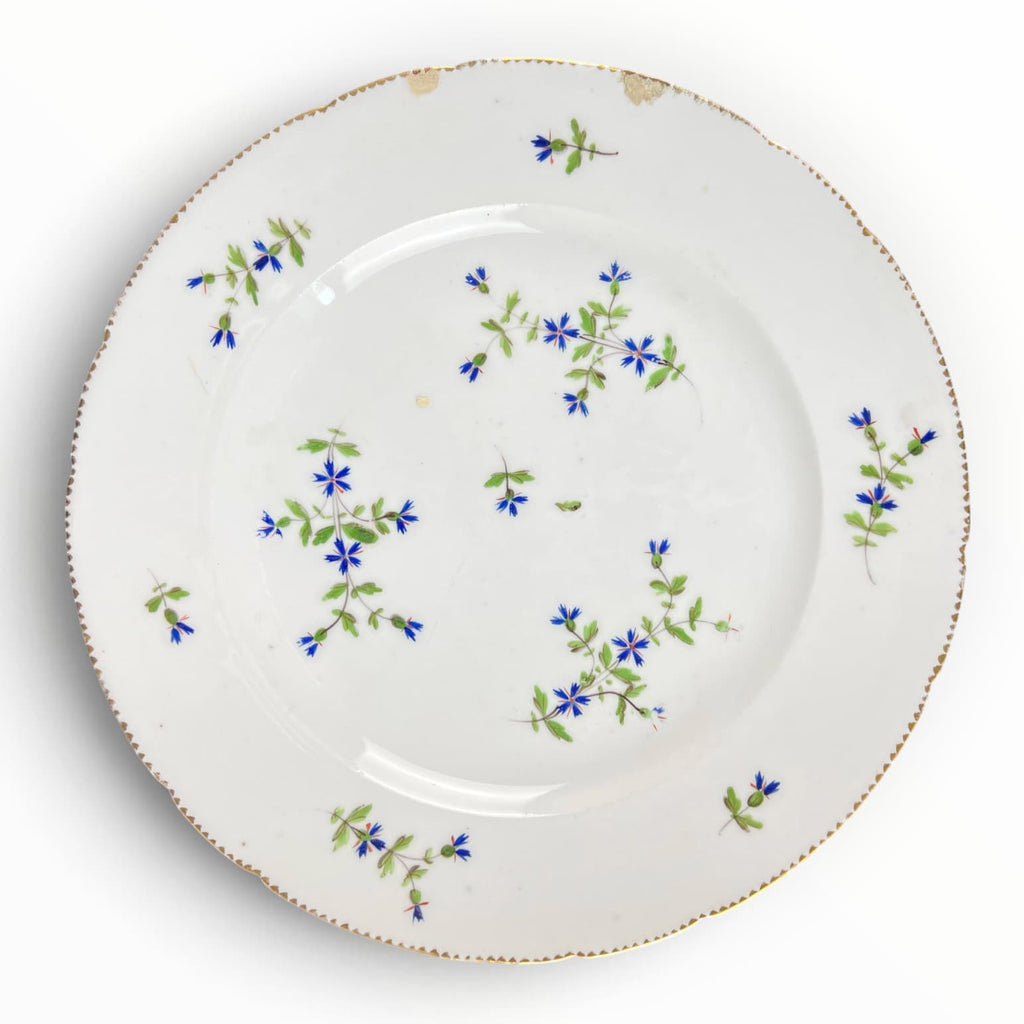 Ancienne assiette en porcelaine de Bordeaux XVIIIe siècle. Décor aux barbeaux.