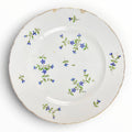 Ancienne assiette en porcelaine de Bordeaux XVIIIe siècle. Décor aux barbeaux.