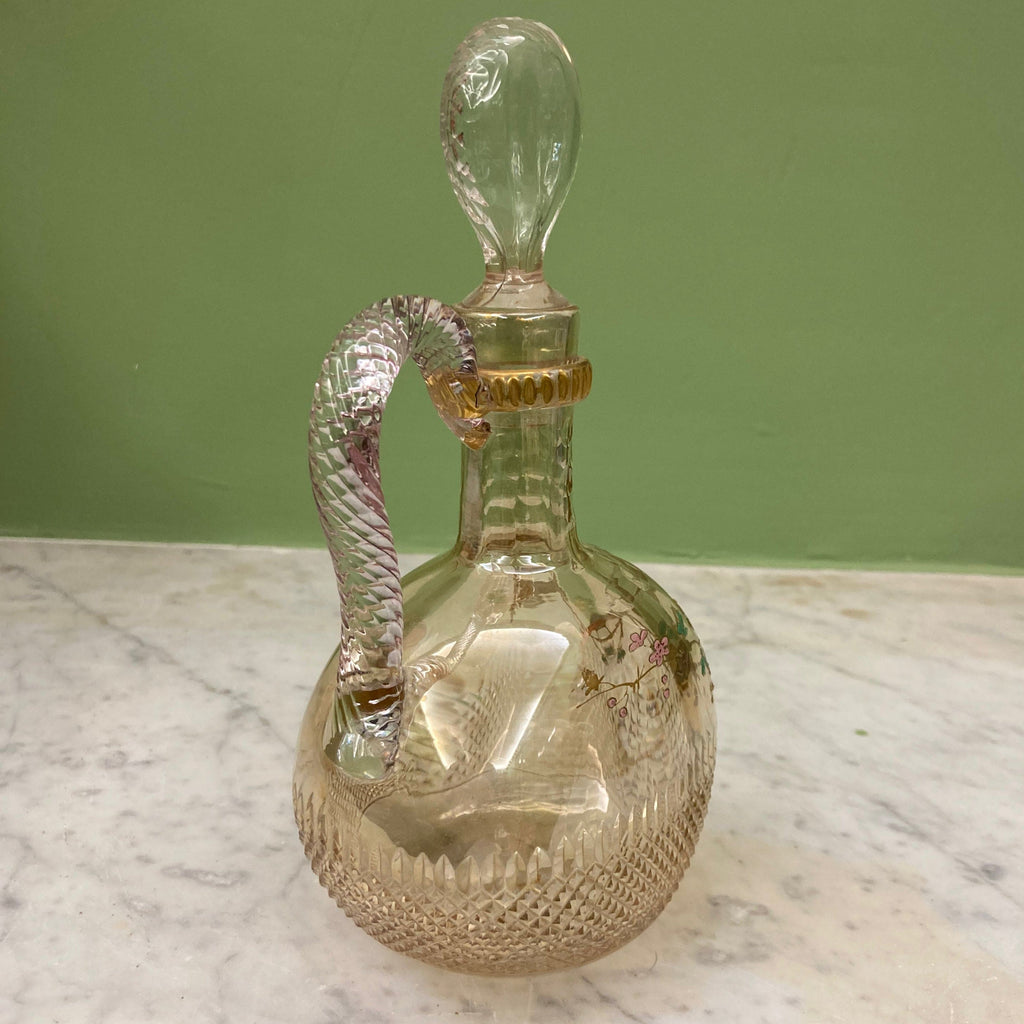 Carafe ancienne en cristal taillé a décor d' un oiseau sur des branchages dorés et émaillés