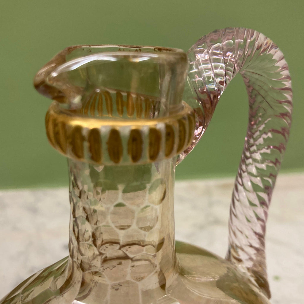 Carafe ancienne en cristal taillé a décor d' un oiseau sur des branchages dorés et émaillés