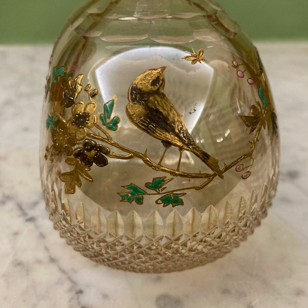 Carafe ancienne en cristal taillé a décor d' un oiseau sur des branchages dorés et émaillés