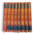 Collection complète de huit volumes du Livre des Mille Nuits et Une Nuit de Mardrus, reliés en demi-veau rouge avec décor oriental doré.