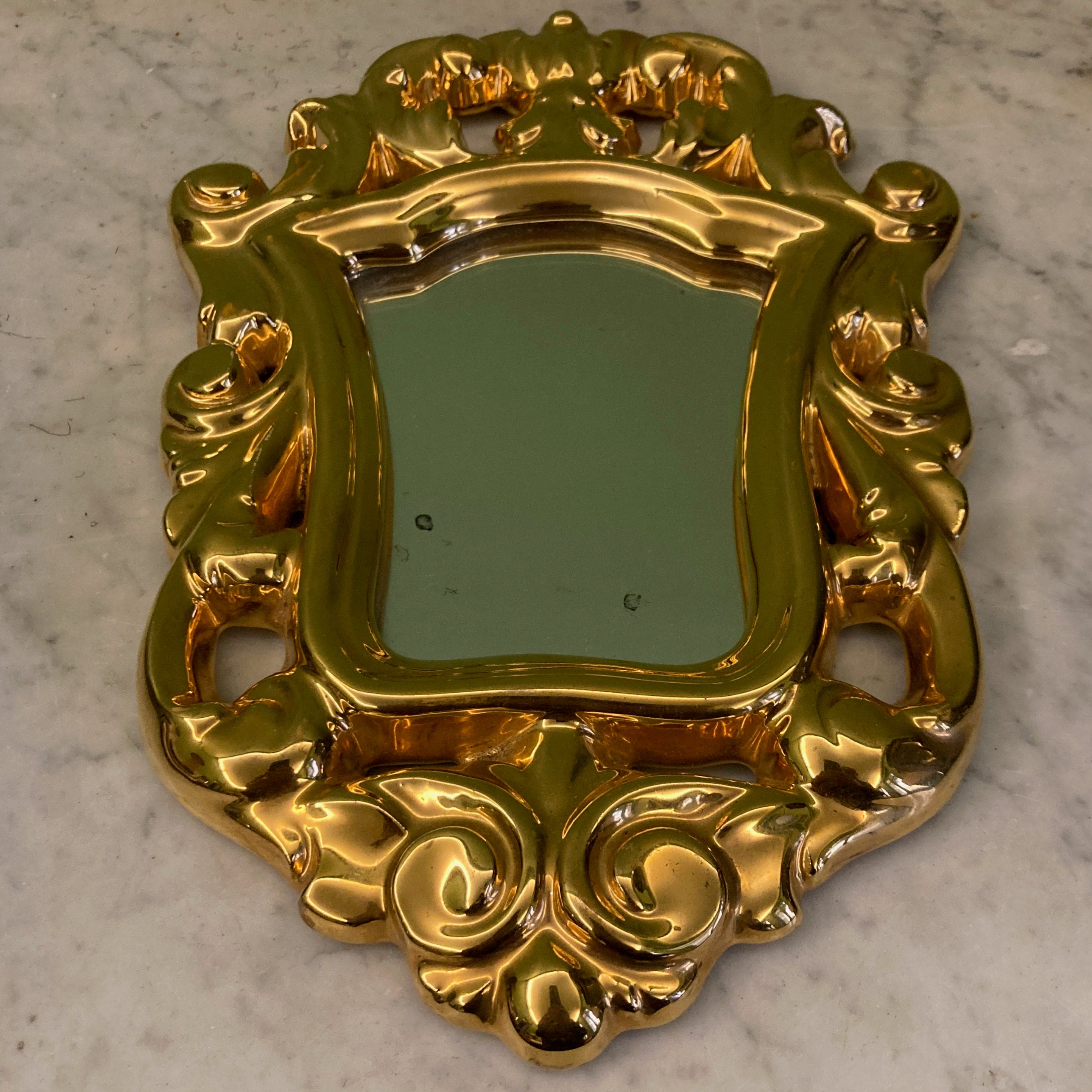 Ancien miroir en céramique dorée par François Lembo