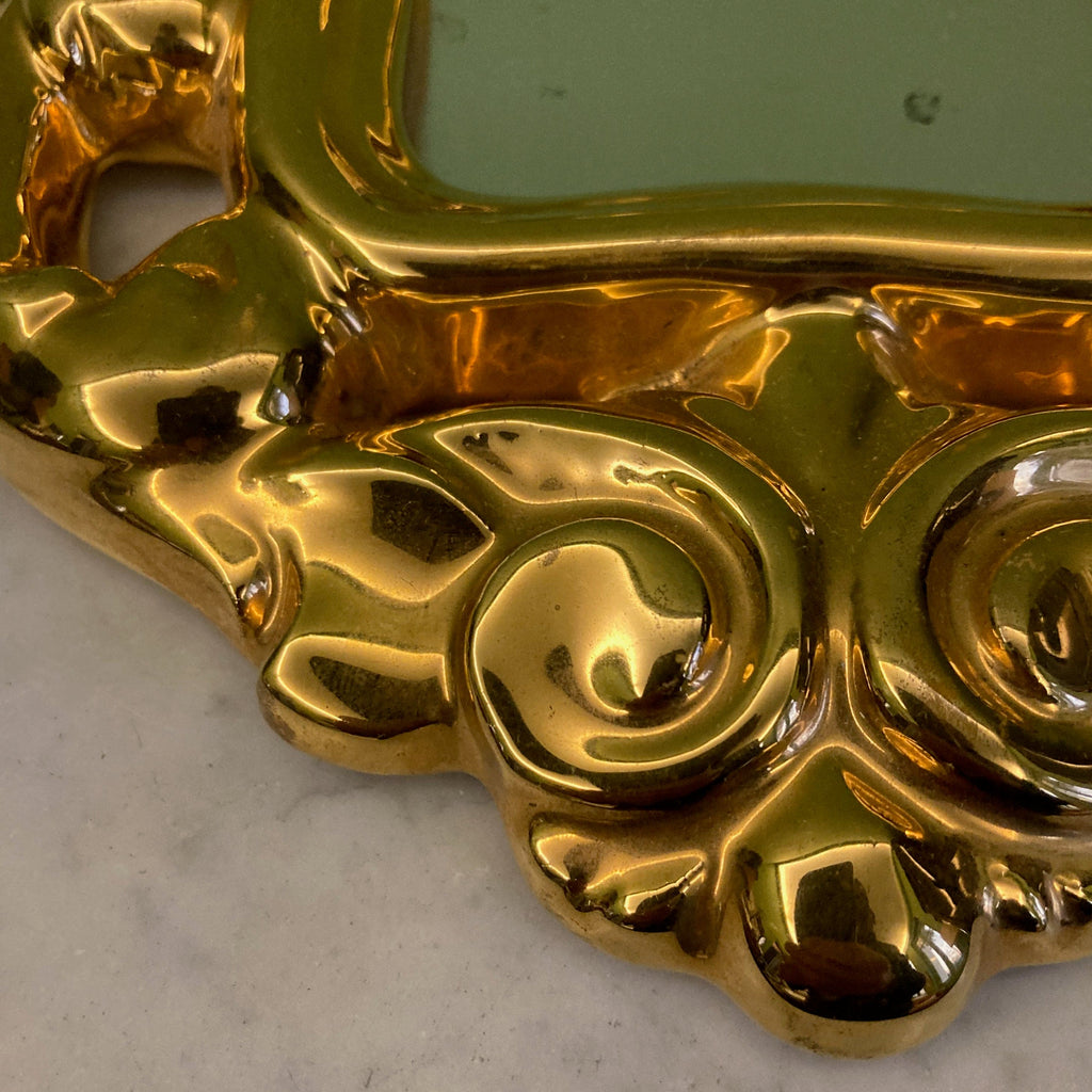 Ancien miroir en céramique dorée par François Lembo
