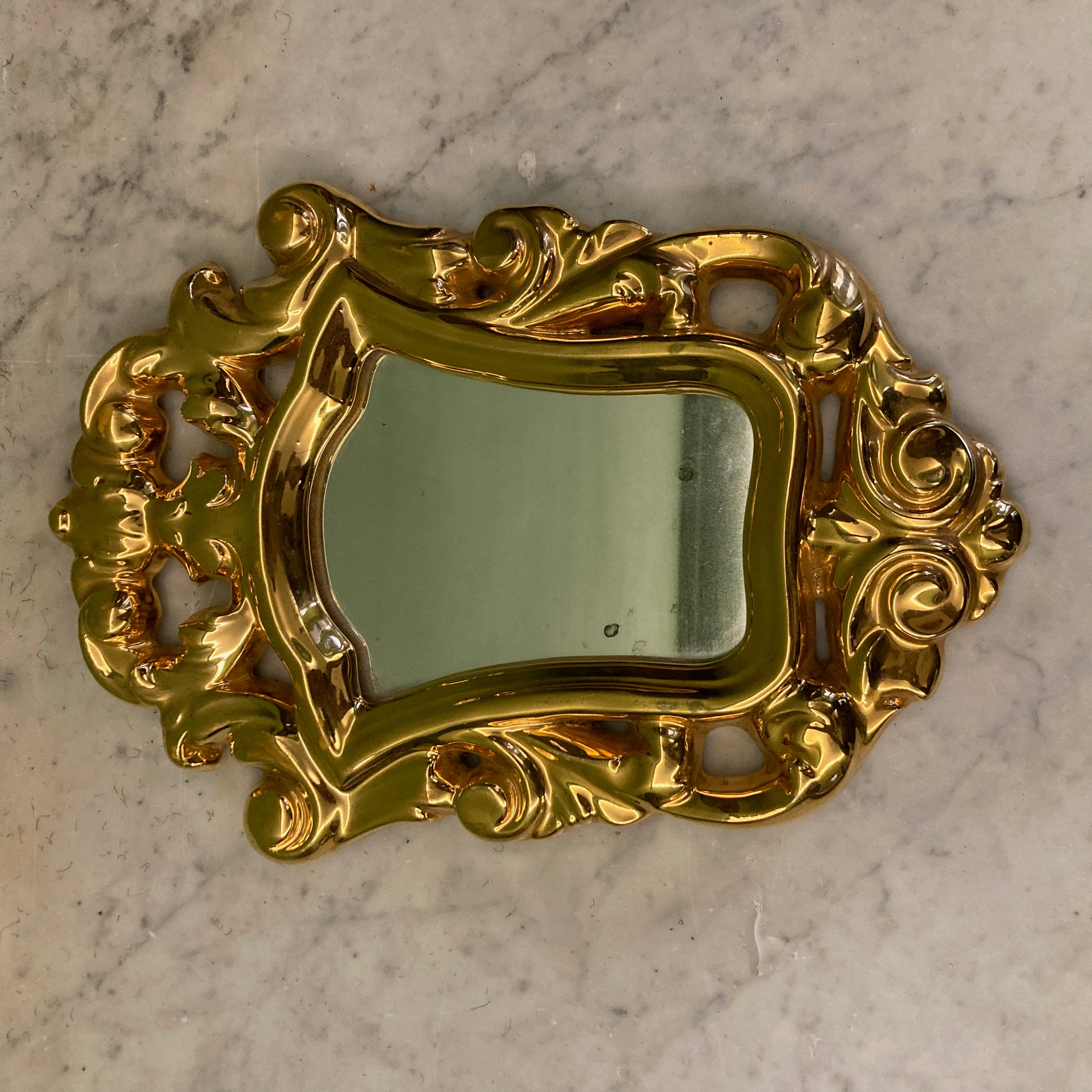 Ancien miroir en céramique dorée par François Lembo