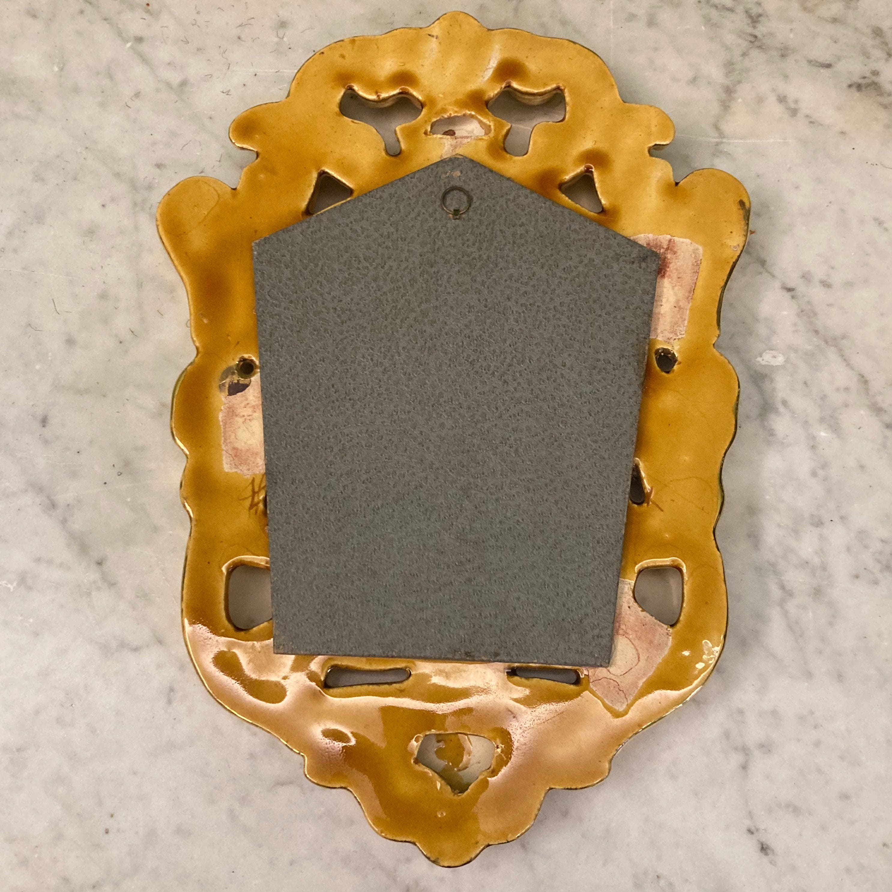 Ancien miroir en céramique dorée par François Lembo