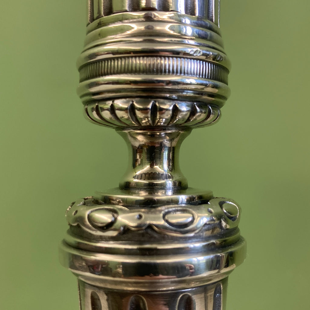 Paire de bougeoirs en bronze argenté signé Voisenet