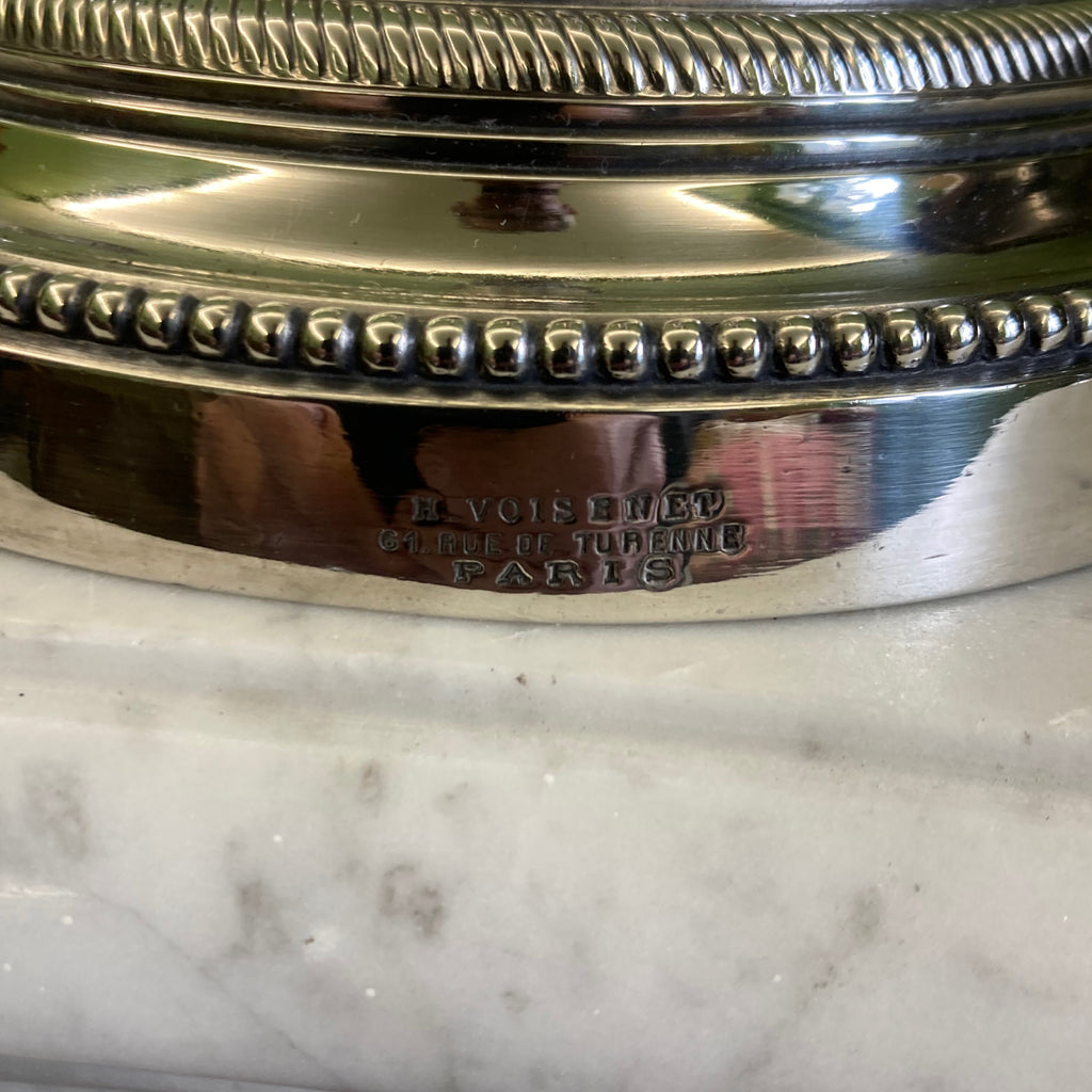 Paire de bougeoirs en bronze argenté signé Voisenet