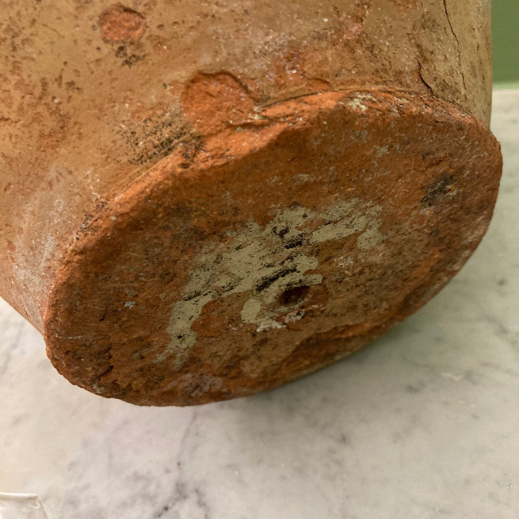 Ancien pot à confit en terre cuite vernissée verte.