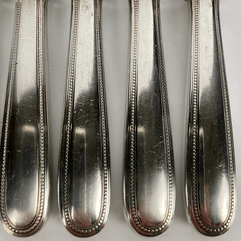 Maison Christofle 8 couteaux à entremets perles