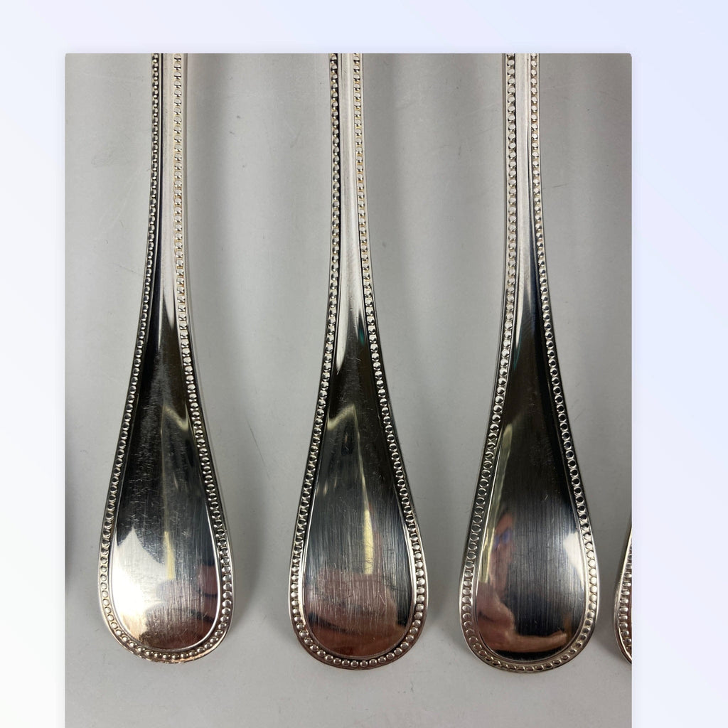 Maison Christofle 9 fourchettes à poisson modèle perle