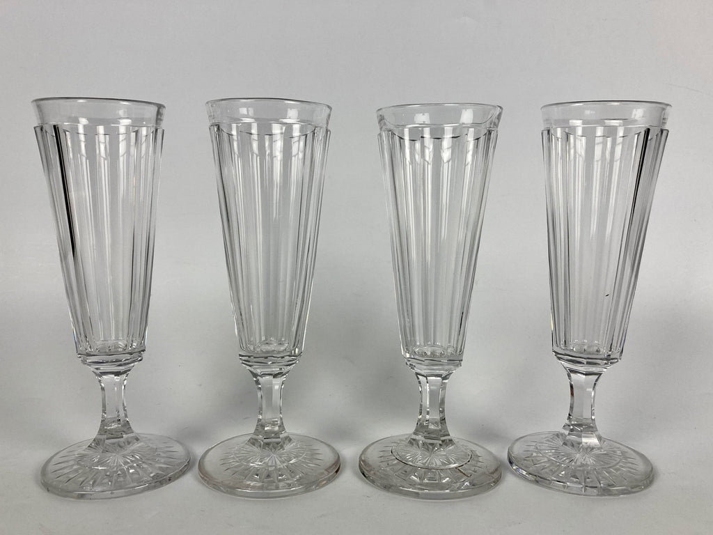 4 flutes à champagne en cristal à côtes plates XIX baccarat saint louis